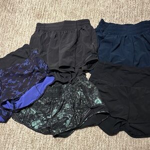 5 pairs of Lululemon assorted shorts. Size 4.